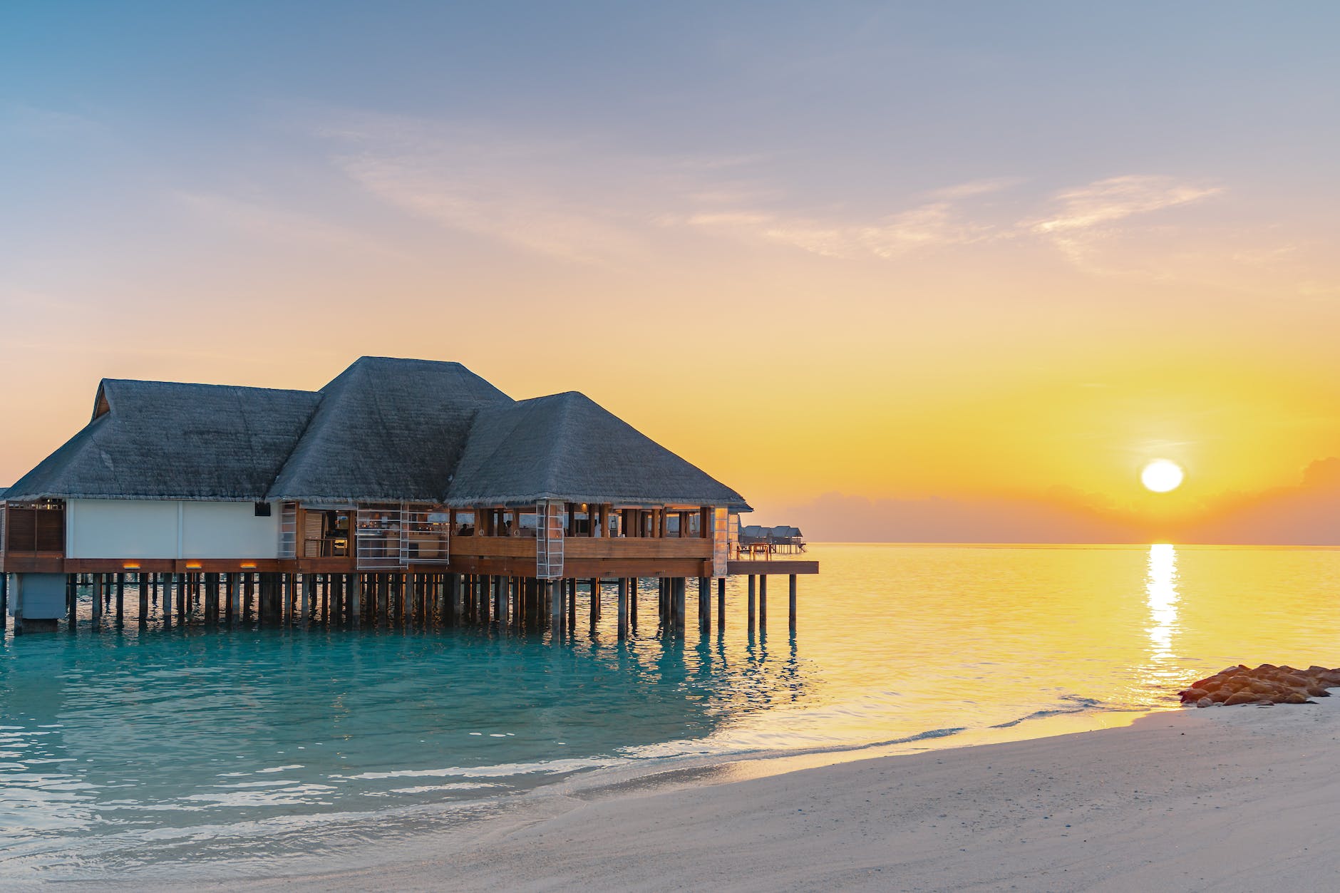 maldives island water villa sunset